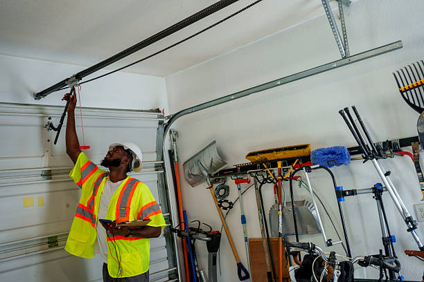 Professional Garage Door Panel Replacement technician working in Mediapolis, IA